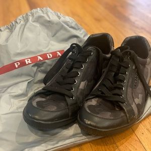 Prada Women’s never worn sneakers in dark camouflage colors.